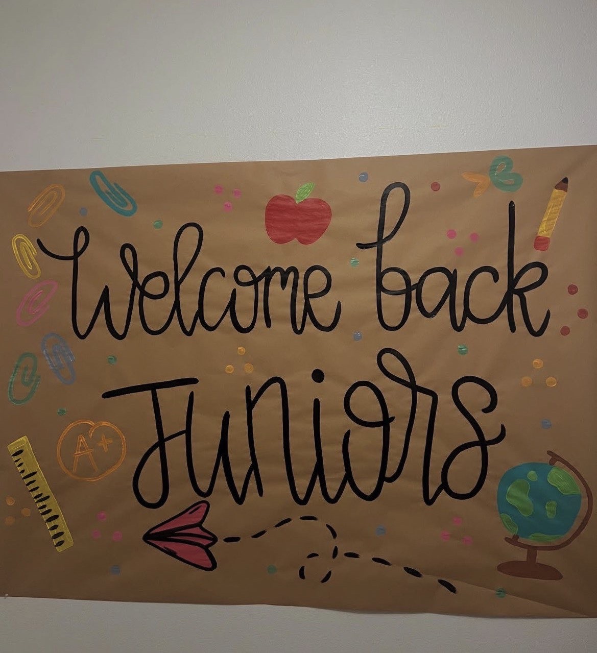 Hand-painted welcome back juniors school banner